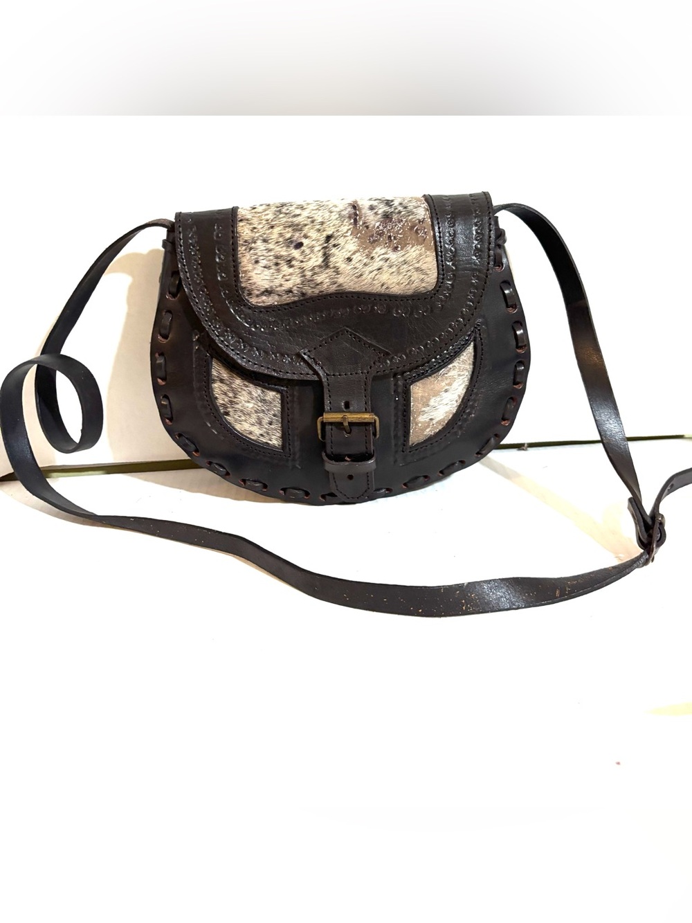 Black Leather Crossbody Saddle Bag with Cowhide Accent